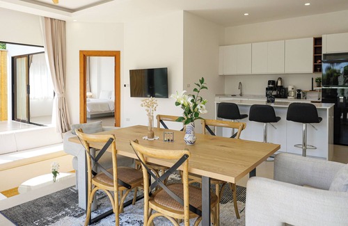 Maret Villa | Modern 2-bedroom villa with private pool, office space, and lush surroundings