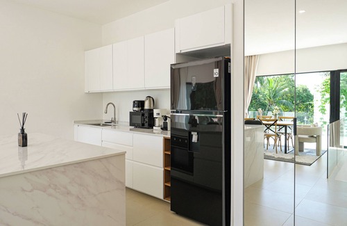 Maret Villa | Modern 2-bedroom villa with private pool, office space, and lush surroundings