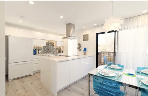 Crown Point Condo | Modern 2BR/2BA Condo, Steps To Beach, Garage Parking, EV Charger