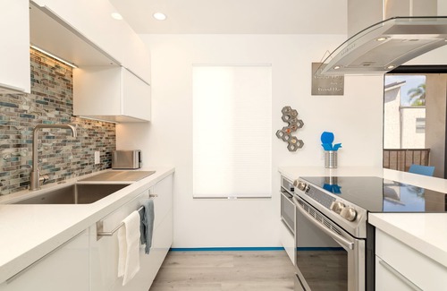 Crown Point Condo | Modern 2BR/2BA Condo, Steps To Beach, Garage Parking, EV Charger