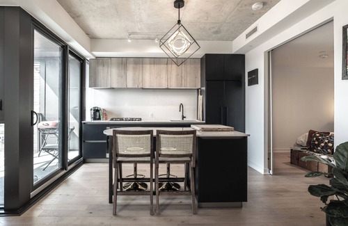 West Bend Condo | Modern 2BR Art, Loft Style Condo