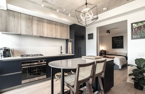 West Bend Condo | Modern 2BR Art, Loft Style Condo