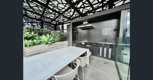 North Melbourne Apartment | Modern 2BR, Pool, Gym & Parking