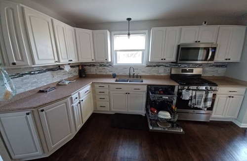 Huntley House | Modern 3 BR with a huge fenced yard and heated pool right by downtown