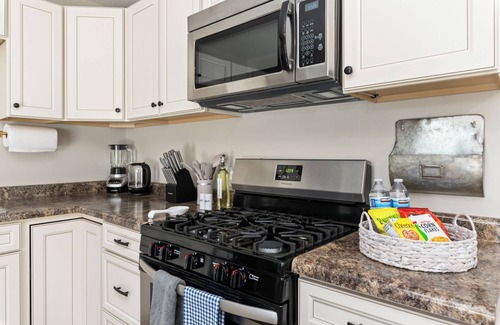 Bettendorf House | Modern 4 Bedroom Home, NEW 2nd Bathroom, Large Fenced Backyard with Patio