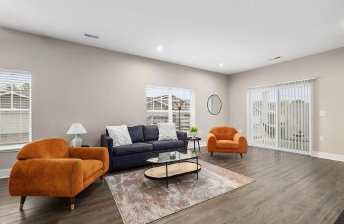 Grandville Apartment | Modern 4BR 4BA Two Unit Condo w Garage and Patio