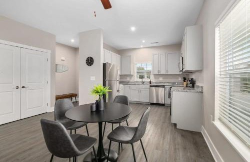 Grandville Apartment | Modern 4BR 4BA Two Unit Condo w Garage and Patio