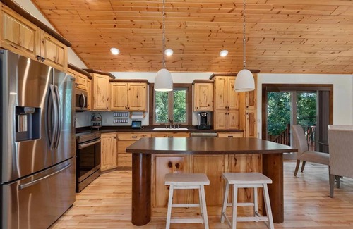 Breezy Point Cabin | Modern 5BD Cabin, Fire Pit, Fenced Yard, Breezy Point