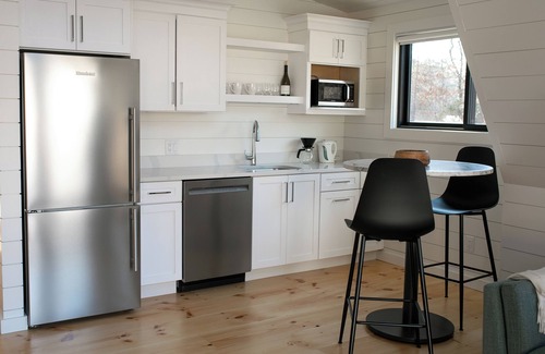 Brewster Cottage | Modern A-Frame cottage with Pool set on a Horse Farm. 5 minutes from the beach!