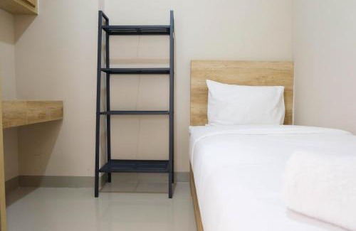 Rawasari Apartment | Modern and Bright 2BR Green Pramuka Apartment By Travelio