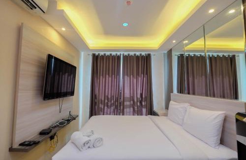East Jakarta Apartment | Modern and Comfy 1BR Apartment at Woodland Park Residence By Travelio