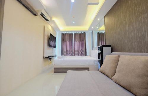 East Jakarta Apartment | Modern and Comfy 1BR Apartment at Woodland Park Residence By Travelio