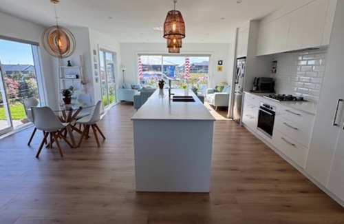 Wharewaka House | Modern and cosy home Private, fully fenced