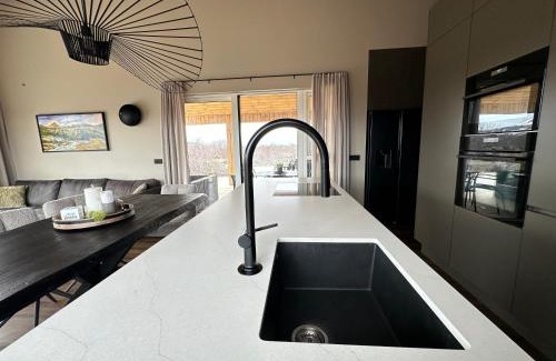 Husafell Ski Chalet | Modern and family friendly Chalet with Ouside Spa - Birta Rentals