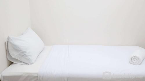 Surabaya Apartment | Modern and Homey 2BR at Puncak Kertajaya Apartment By Travelio