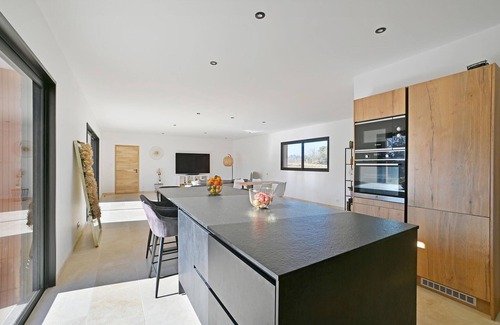 Les Plans House | Modern and spacious vacation home with pool.