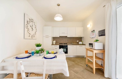 Monte Petrosu Apartment | modern apartment 5 min from the sea with air conditioning, swimming pool, wi-fi