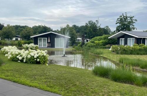 Municipality of Veldhoven Ski Chalet | Modern chalet on the water in the Brabant Kempen