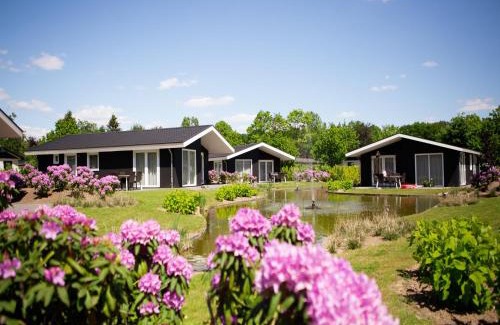 Municipality of Veldhoven Ski Chalet | Modern chalet on the water in the Brabant Kempen