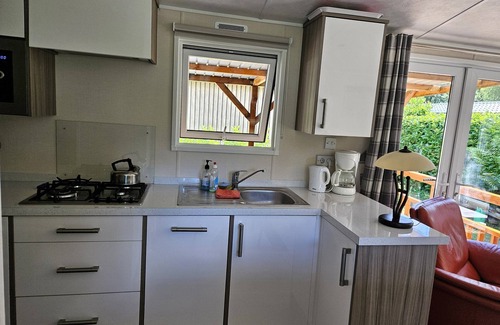 Municipality of Epe Ski Chalet | Modern chalet with cozy porch: the Veluwe Feel Good