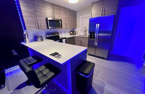 Brookwood Apartment | Modern Chrome Heart Haven - Fireplace Bed