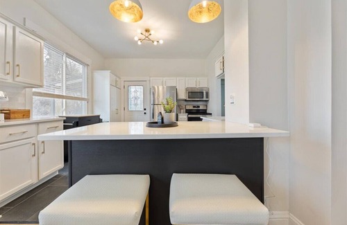 Southeast Omaha House | Modern Comfort Walk to Zoo & Lauritzen Gardens, King Bed, Sauna, Kids wagon