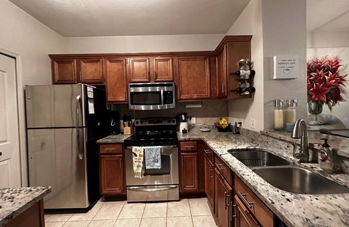Sarasota Condo | Modern condo in resort style gated community with large pool, gym, tennis, bbq.