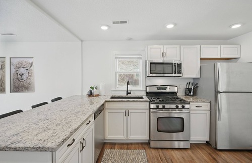 North of Grand House | Modern Farmhouse | 4 Kings + Loft | On Ingersoll