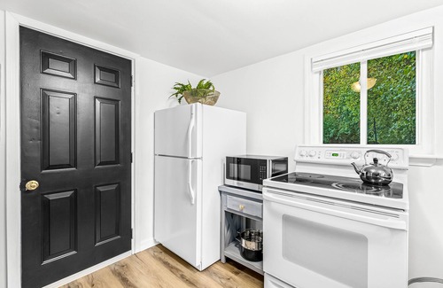 Plymouth House | Modern Farmhouse Bungalow with Firepit! King Bed + Walk to Downtown