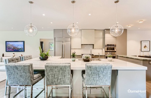 Green Meadows House | Modern Gem with Hot Tub & Game Room, 10-Min to Downtown and CU!