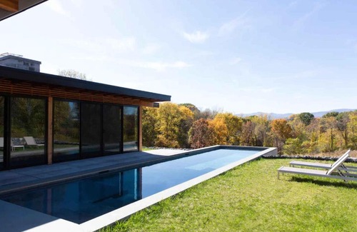 Hudson House | Modern Glass House with Pool & Catskill views in Hudson Valley