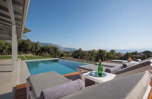 Dassia Villa | Modern guest house with private pool and fantastic views to the beach