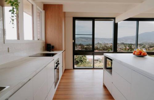 Howrah Apartment | Modern Home overlooking River