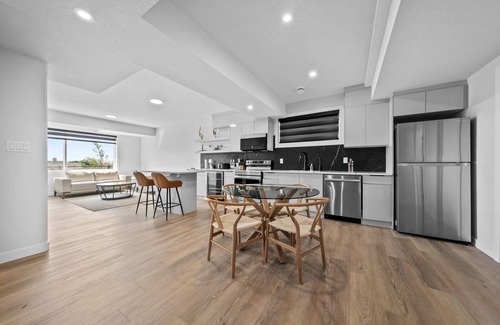 Leduc County House | Modern home-style space close to airport.