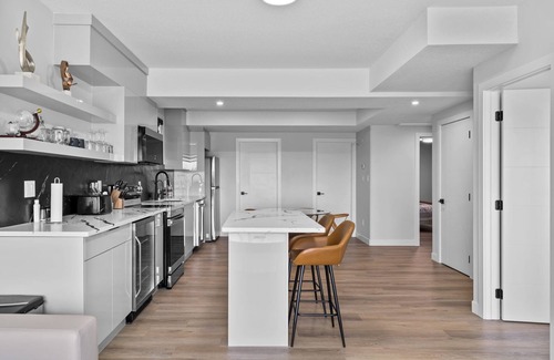 Leduc County House | Modern home-style space close to airport.