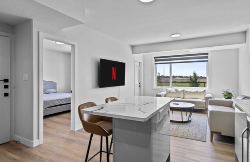 Leduc County House | Modern home-style space close to airport.