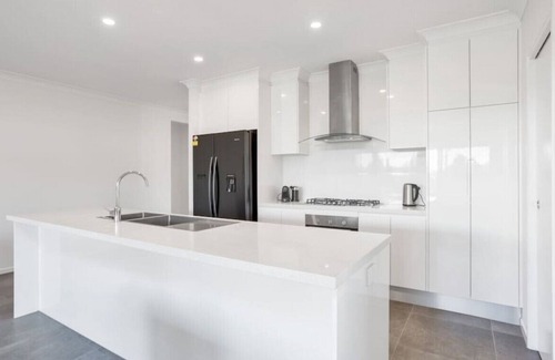 Trinity Beach House | Modern Home w/ Private Spa and Fenced Garden