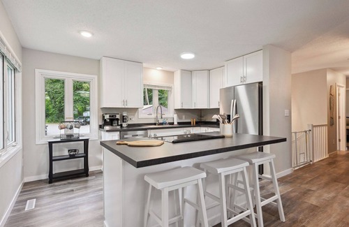 Deerwood Cabin | Modern Lakefront Home with Game Room and Large Deck!