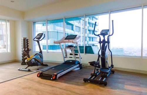 Pekayon Jaya Apartment | Modern Look 2BR at Grand Kamala Lagoon Apartment By Travelio