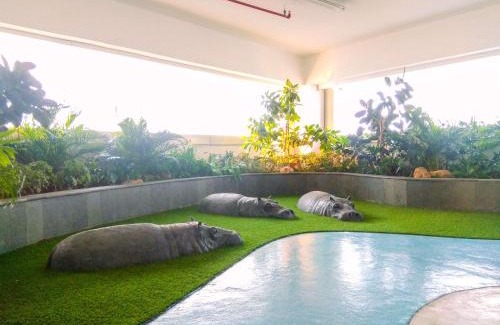 Pekayon Jaya Apartment | Modern Look 2BR at Grand Kamala Lagoon Apartment By Travelio