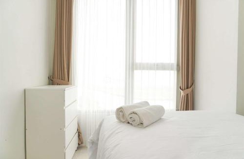 Pantai Indah Kapuk Apartment | Modern Look and Comfy 2BR Gold Coast Apartment By Travelio