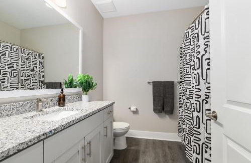 Grandville House | Modern New Build 4BR 4BA Two Condo w Garage and Patio