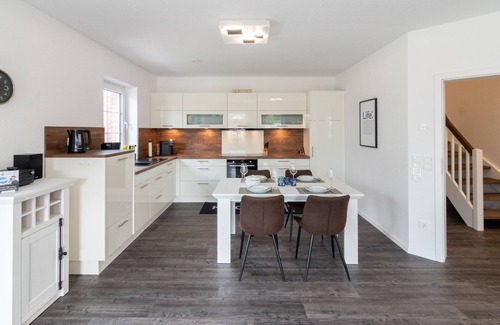 Dornum House | Modern new-build semi-detached house Landhaus Seewind with sauna