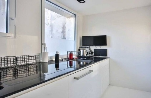 Saint-Merri Apartment | MODERN, PLUSH , LUXE& TOP FLOOR- A SIGNATURE MARAIS HOME