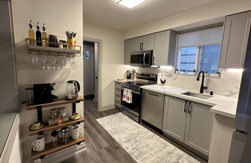 Woodbine Gardens House | Modern retreat in the city w/firepit, covered back porch, in suite laundry, WFH,