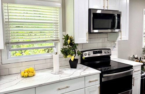 Hillcrest Heights House | Modern Retreat with Hot Tub, EV Charger, Fitness Room- 15 Mins to DC