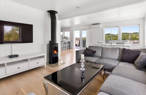 Osteroy House | Modern semi-detached house in natural surroundings with beautiful fjord view.