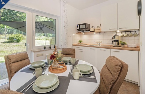Garz Apartment | Modern semi-detached house with terrace and garden furniture