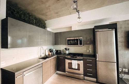 Niagara Apartment | Modern, spacious condo for the busy professional right in the heart of the city!