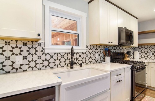 Macatawa House | Modern & Spacious Holland home with a hot tub, pool table, fire pit and more!